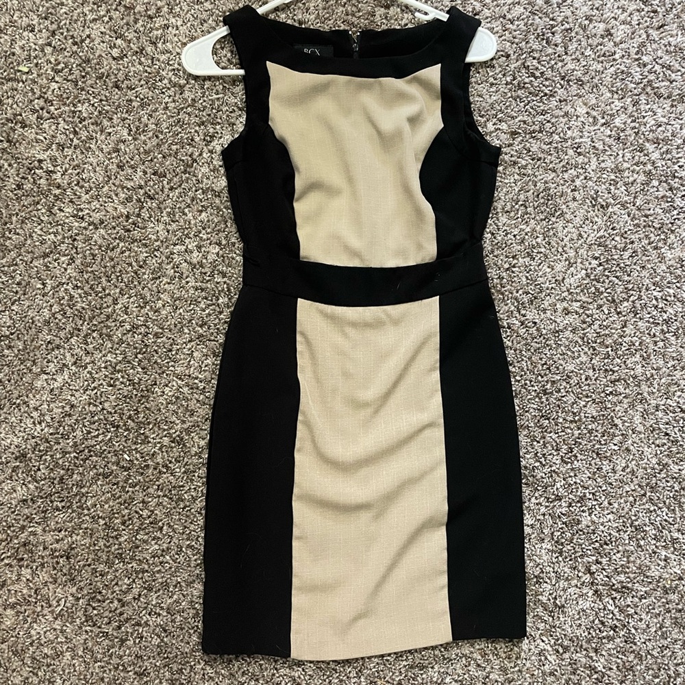 Size 3 tan and black professional dress. Back zipper.